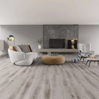 A living room with white walls and wooden floors.