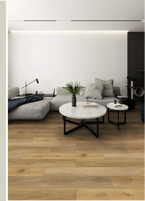 A living room with white walls and wooden floors.