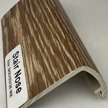 A close up of the corner of a wooden shelf